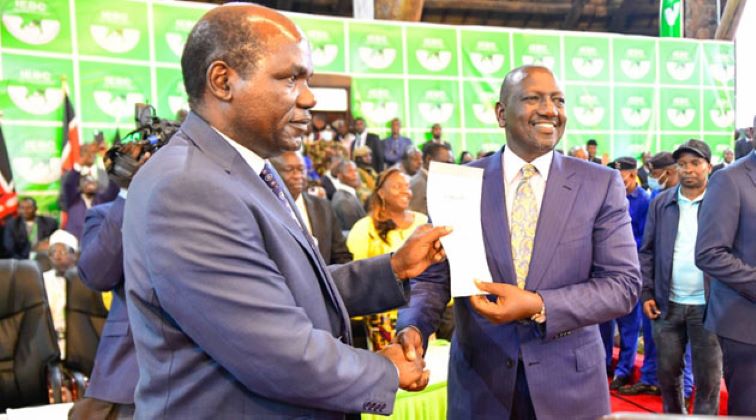 Wafula Chebukati and president Elect William Ruto.
